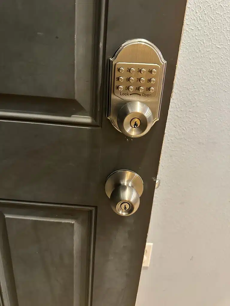 Residential keypad deadbolt and knob lock installed by Quickey Locksmith on a Houston home